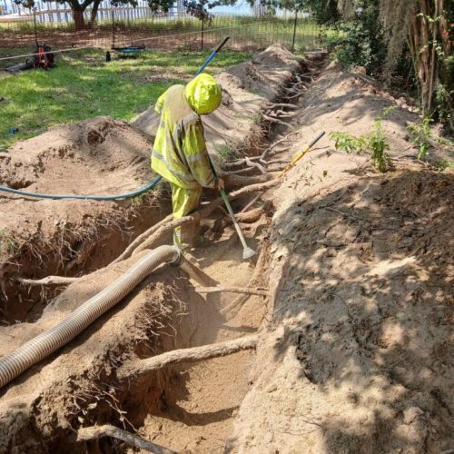 Point Clear, AL - Air Excavation Under Tree Roots for Drain Line Installation