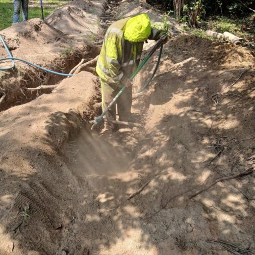 Point Clear, AL - Air Excavation Under Tree Roots for Drain Line Installation