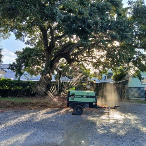 Fairhope, AL -  air excavation to find roots ahead of construction
