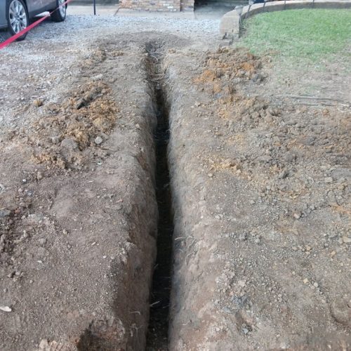 Fairhope, AL -  air excavation to find roots ahead of construction